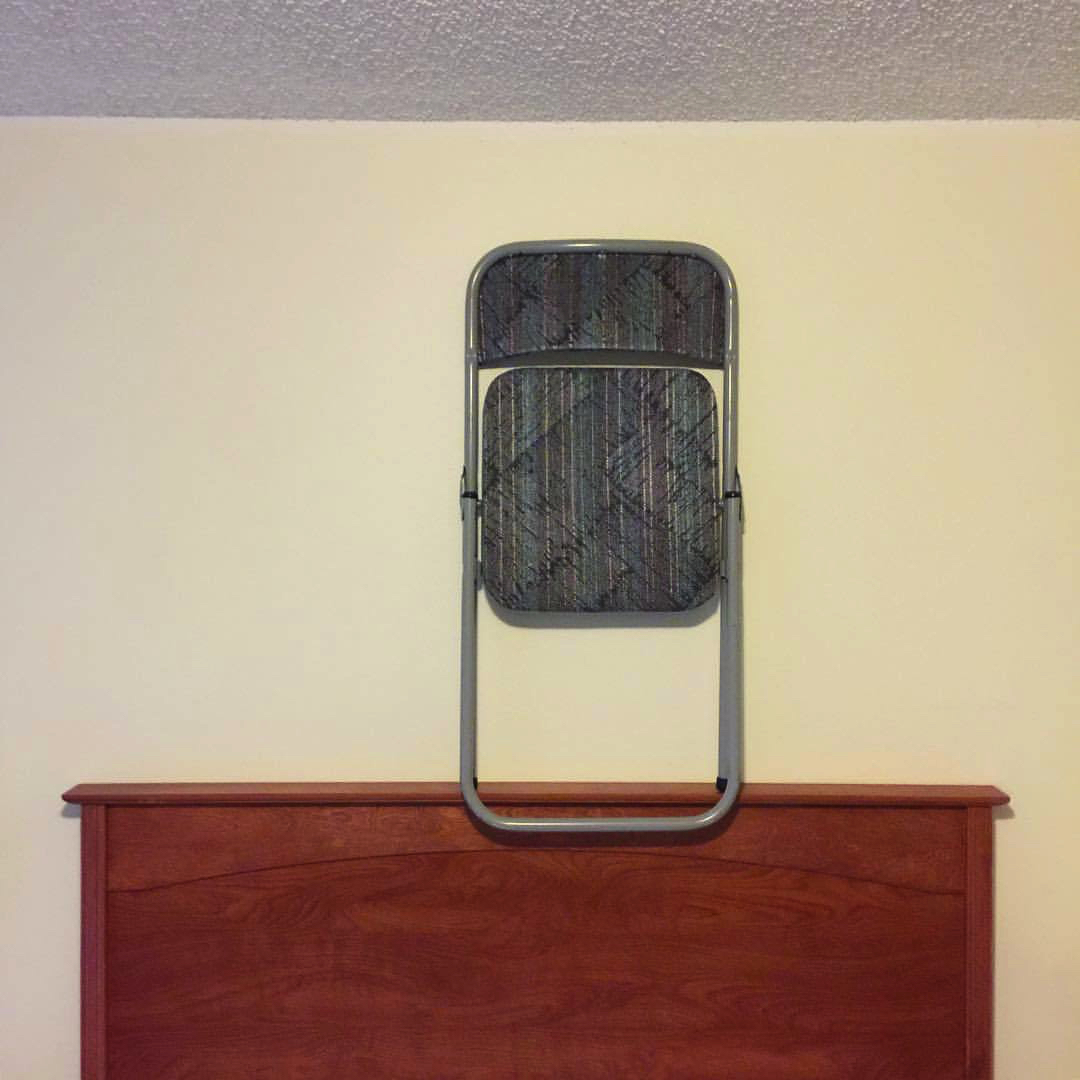 2017 08 27 - 239 of 365 . folding chair, headboard (motel room)