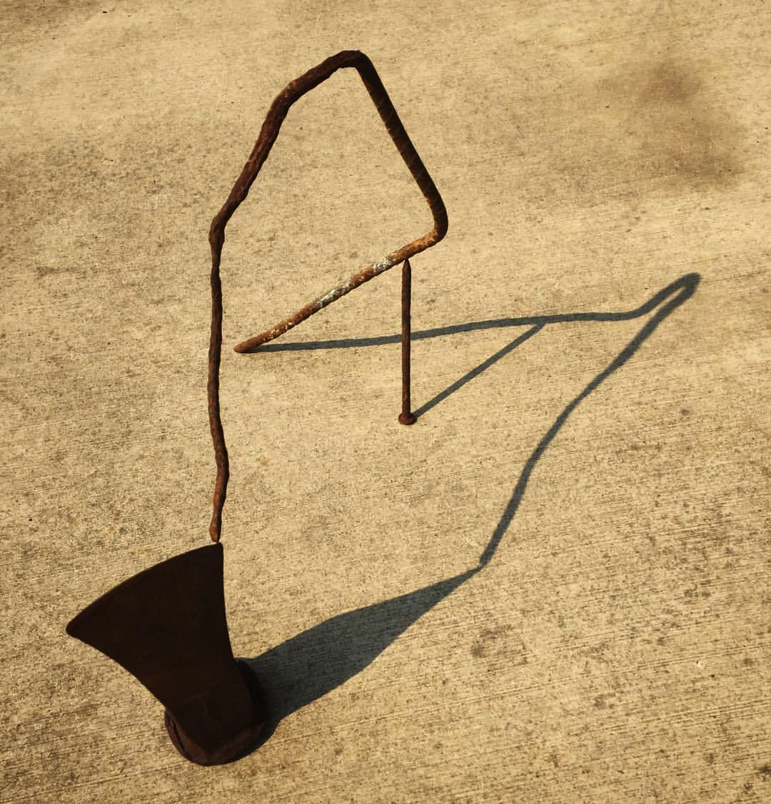 2017 09 16 - 259 of 365 . splitting wedge, rebar, nail, shadow